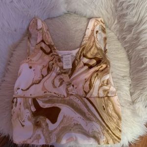 Size small in a brownish marble color